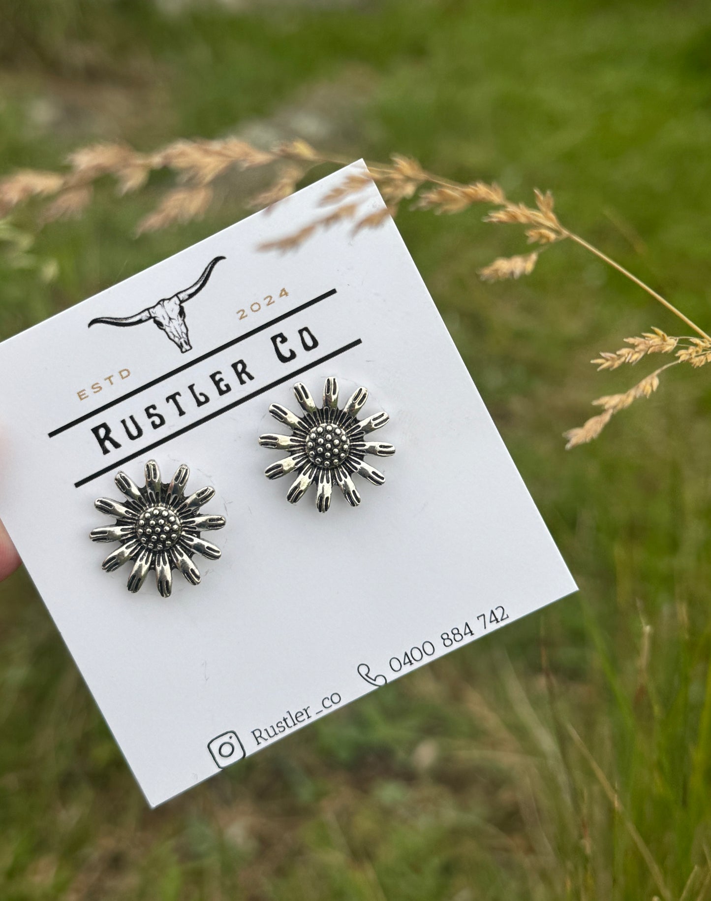 Silver flower studs